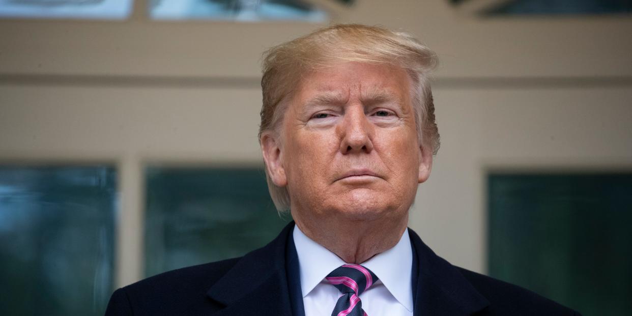 President Donald Trump poses for photos as he meets with Paraguay's President Mario Abdo Benitez at the White House, Friday, Dec. 13, 2019, in Washington. (AP Photo/ Evan Vucci)