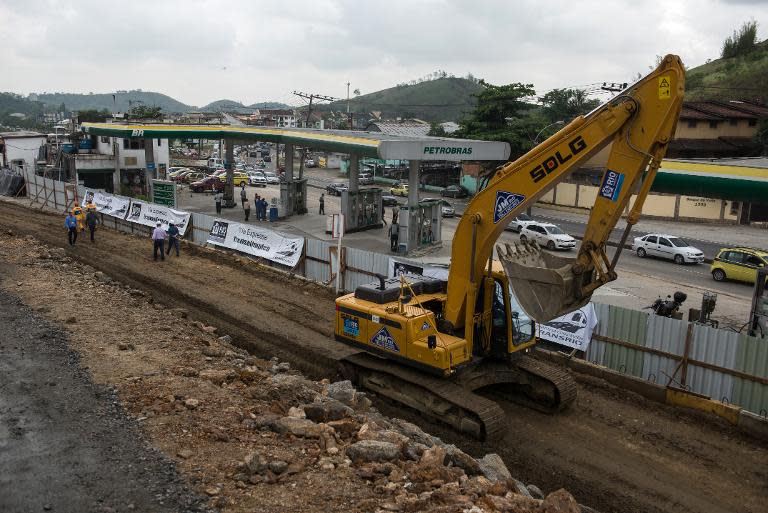 View of the constructing site of a new express way called Transolimpica in Rio de Janeiro, Brazil, on November 08, 2013, part of the modernization of neighborhoods prior to the 2016 Olympic Games