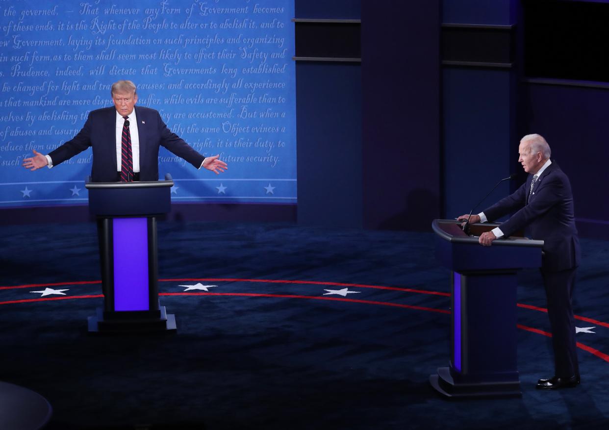 Donald Trump and Democratic presidential candidate Joe Biden participate in the first 2020 presidential election debate in Cleveland, Ohio on 29 September. (EPA)