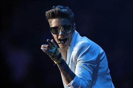 Singer Justin Bieber performs at Staples Center during his Believe Tour in Los Angeles, California in this June 24, 2013 file photo. REUTERS/Mario Anzuoni/Files