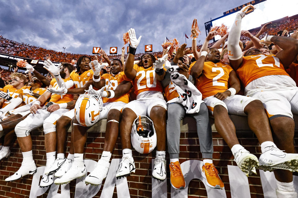 FILE - Tennessee running back Jaylen Wright (20) and teammates celebrates a 38-33 win after an NCAA college football game against Florida, Saturday, Sept. 24, 2022, in Knoxville, Tenn. (AP Photo/Wade Payne, File)