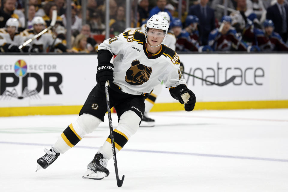 FILE - Boston Bruins' Trent Frederic skates during the second period of an NHL hockey game against the Colorado Avalanche Saturday, Dec. 3, 2022, in Boston. The Bruins avoided arbitration with depth forward Trent Frederic. They signed him to a two-year deal worth $4.6 million, Tuesday, Aug. 1, 2023.(AP Photo/Winslow Townson, File)