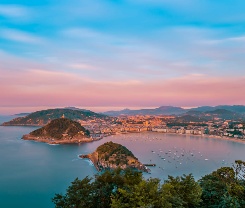 San Sebastián comes with beautiful bay views and many Michelin stars. <p>Dhwee/Getty Images</p>