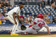 St. Louis Cardinals' Paul Goldschmidt slides into third with a triple as Pittsburgh Pirates third baseman Ke'Bryan Hayes awaits the throw during the first inning of a baseball game Friday, Aug. 27, 2021, in Pittsburgh. (AP Photo/Keith Srakocic)