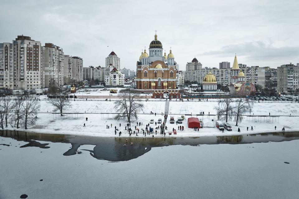Ukrainians immerse themselves in icy water to celebrate Epiphany in Kyiv, Ukraine, on Jan. 6, 2024. (Kostiantyn Liberov/Libkos/Getty Images)
