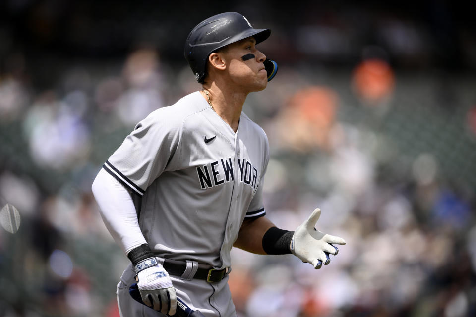 New York Yankees' Aaron Judge walks to first during the first inning of a baseball game against the Baltimore Orioles, Thursday, May 19, 2022, in Baltimore. (AP Photo/Nick Wass)