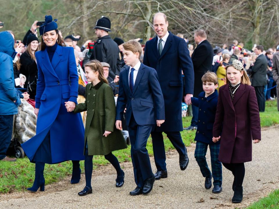 The Prince and Princess of Wales walk on Christmas morning 2023 at Sandringham with their children.