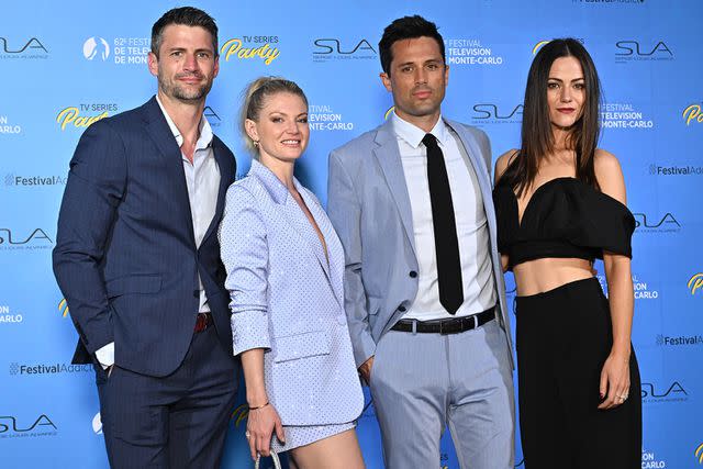 <p>Stephane Cardinale - Corbis/Corbis via Getty</p> James Lafferty, Cariba Heine, Stephen Colletti and Alexandra Park in 2023