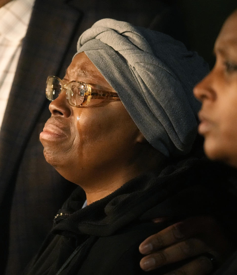 FILE - Sheneen McClain, Elijah McClain's mother, is consoled by Omar Montgomery outside the Adams County, Colo., Justice Center, Dec. 22, 2023, in Brighton, Colo. Former Aurora Fire Department paramedic Jeremy Cooper faces up to three years in prison when he is scheduled to be sentenced Friday, April 26, 2024, for criminally negligent homicide in Elijah McClain's death. (AP Photo/David Zalubowski, File)