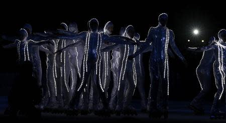 Performers take part during the opening ceremony of the 2014 Sochi Winter Olympics, February 7, 2014. REUTERS/Jim Young