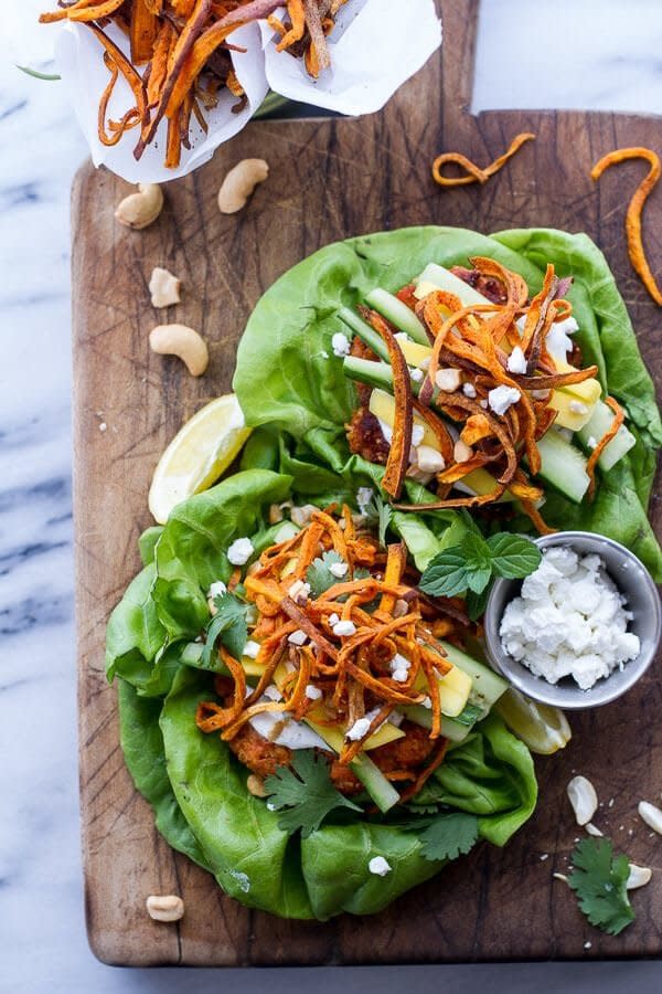 <strong>Get the <a href="https://www.halfbakedharvest.com/curried-salmon-burger-lettuce-wraps-wcrispy-sweet-potato-straws-goat-cheese/" target="_blank">Curried Salmon Burger Lettuce Wraps</a> recipe from Half Baked Harvest</strong>