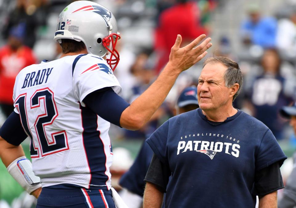 New England Patriots head coach Bill Belichick and  quarterback Tom Brady (12) before the game against The New York Jets at MetLife Stadium.