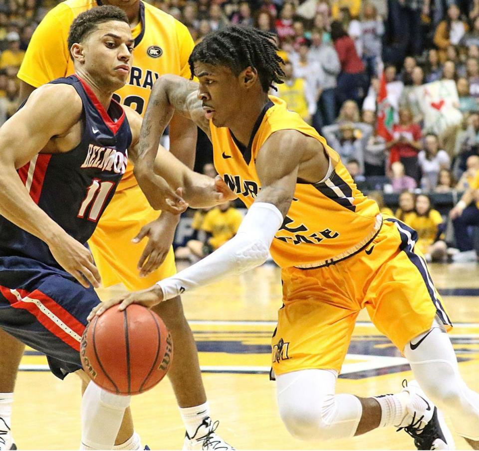 Murray State's Ja Morant drives against Belmont's Kevin McClain (11) in Thursday's game.