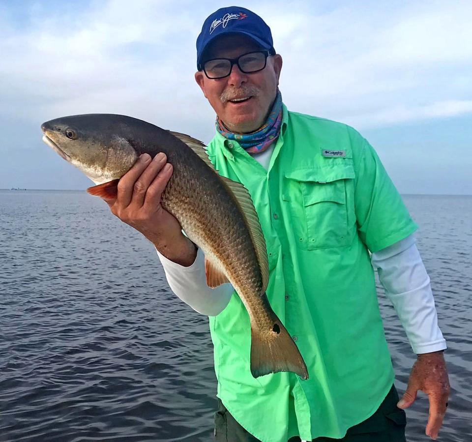 Walt Hunziker, 73, of LIthia, caught this slot size redfish, his very first, on a swimbait while fishing in Steinhatchee recently. 