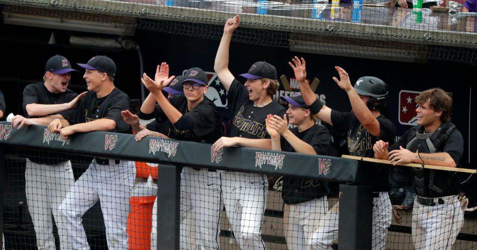 Denmark players cheer during a WIAA Division 2 semifinal baseball game against Jefferson on Wednesday.