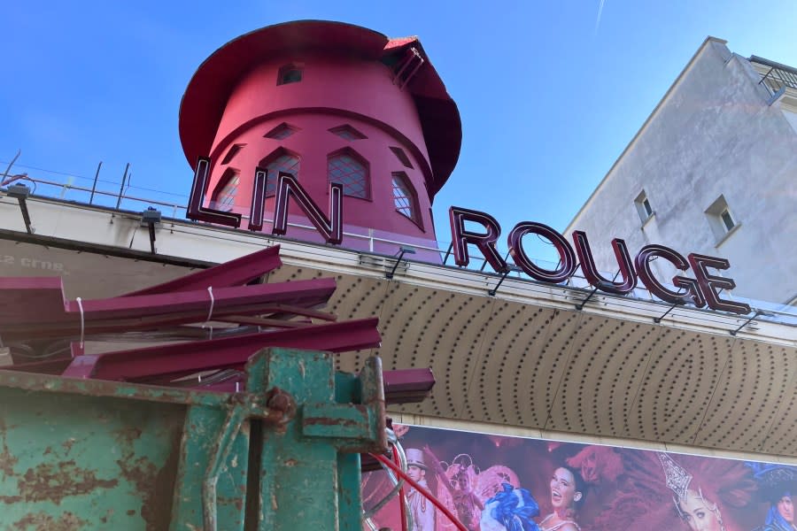 The facade of the Moulin Rouge (Red Mill) cabaret is seen Thursday, April 25, 2024 in Paris. The windmill from the Moulin Rouge, the 19th century Parisian cabaret, has fallen off the roof overnight along with some of the letters in its name. (AP Photo/Oleg Cetinic)