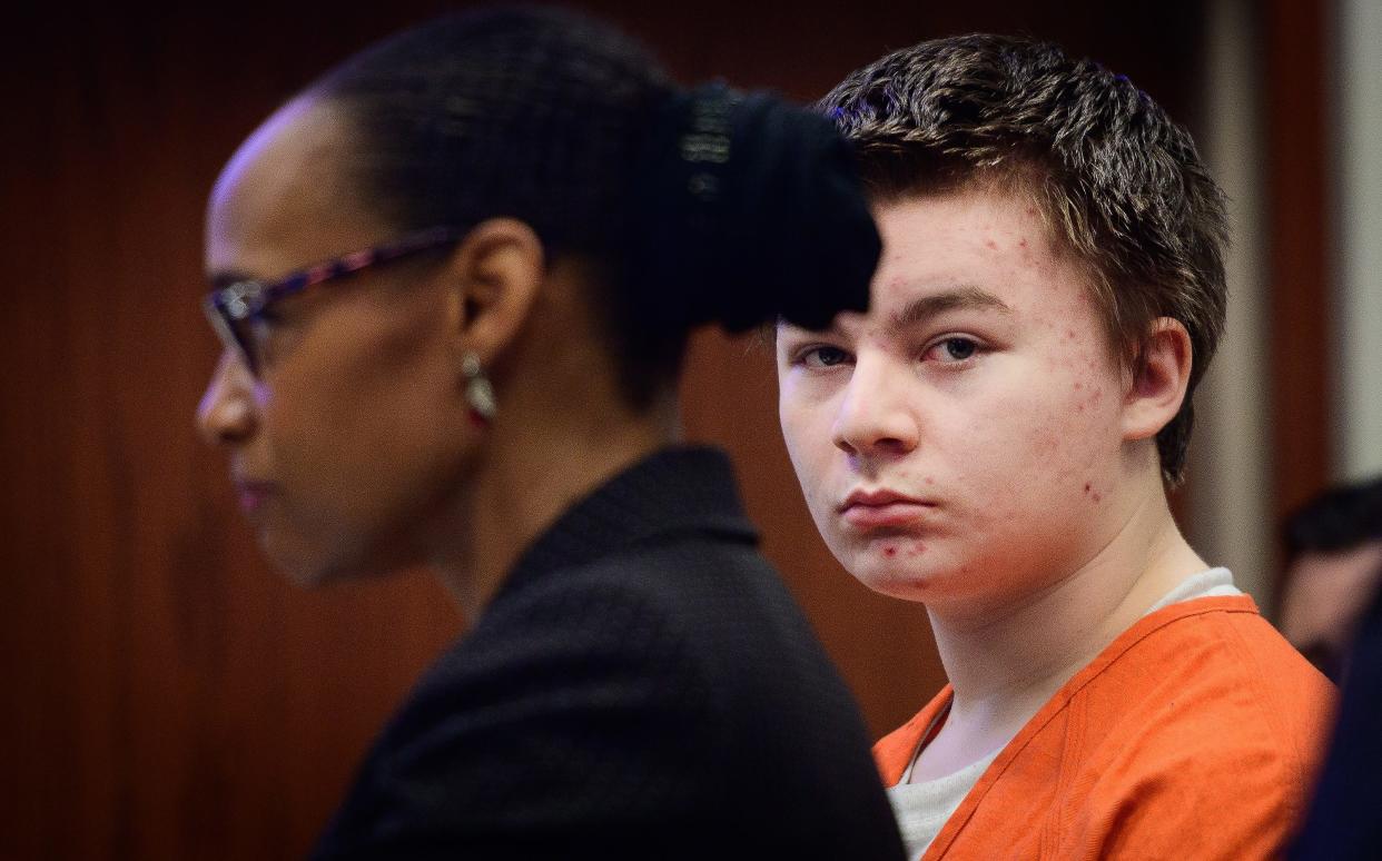 Aiden Fucci stands with his attorney, Rosemarie Peoples, before Circuit Judge Lee Smith in his courtroom in the St. Johns County courthouse for a hearing on Friday, Aug. 5, 2022. Fucci has pleaded not guilty to first-degree murder in the death of Tristyn Bailey, 13, in the Durbin Crossing community in northern St. Johns County in May 2021. 