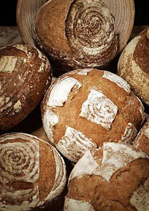 Pictures of sourdough bread seem like a healthy denial of helplessness. <span class="copyright">(Stephen Osman / Los Angeles Times)</span>