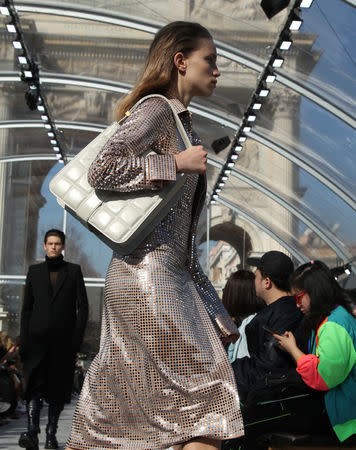 A model presents a creation by Bottega Veneta during the Milan Fashion Week in Milan, Italy February 22, 2019. REUTERS/Alessandro Garofalo