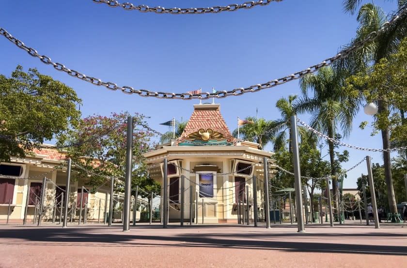 ANAHEIM, CA - SEPTEMBER 30: Stanchions that normally direct long lines remain empty at the Disneyland Park ticket booth while Disneyland remains closed on Wednesday, Sept. 30, 2020 in Anaheim, CA. After suffering losses for months due to Gov. Newsom's mandatory coronavirus shut-down, Disney says it will lay off 28,000 employees across its parks, experiences and consumer products segment.(Allen J. Schaben / Los Angeles Times)