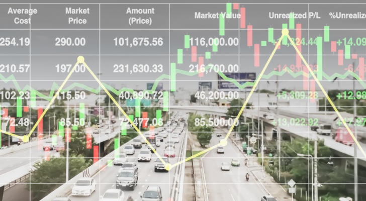 Picture of a highway system with business statistics on top of it. Infrastructure stocks.