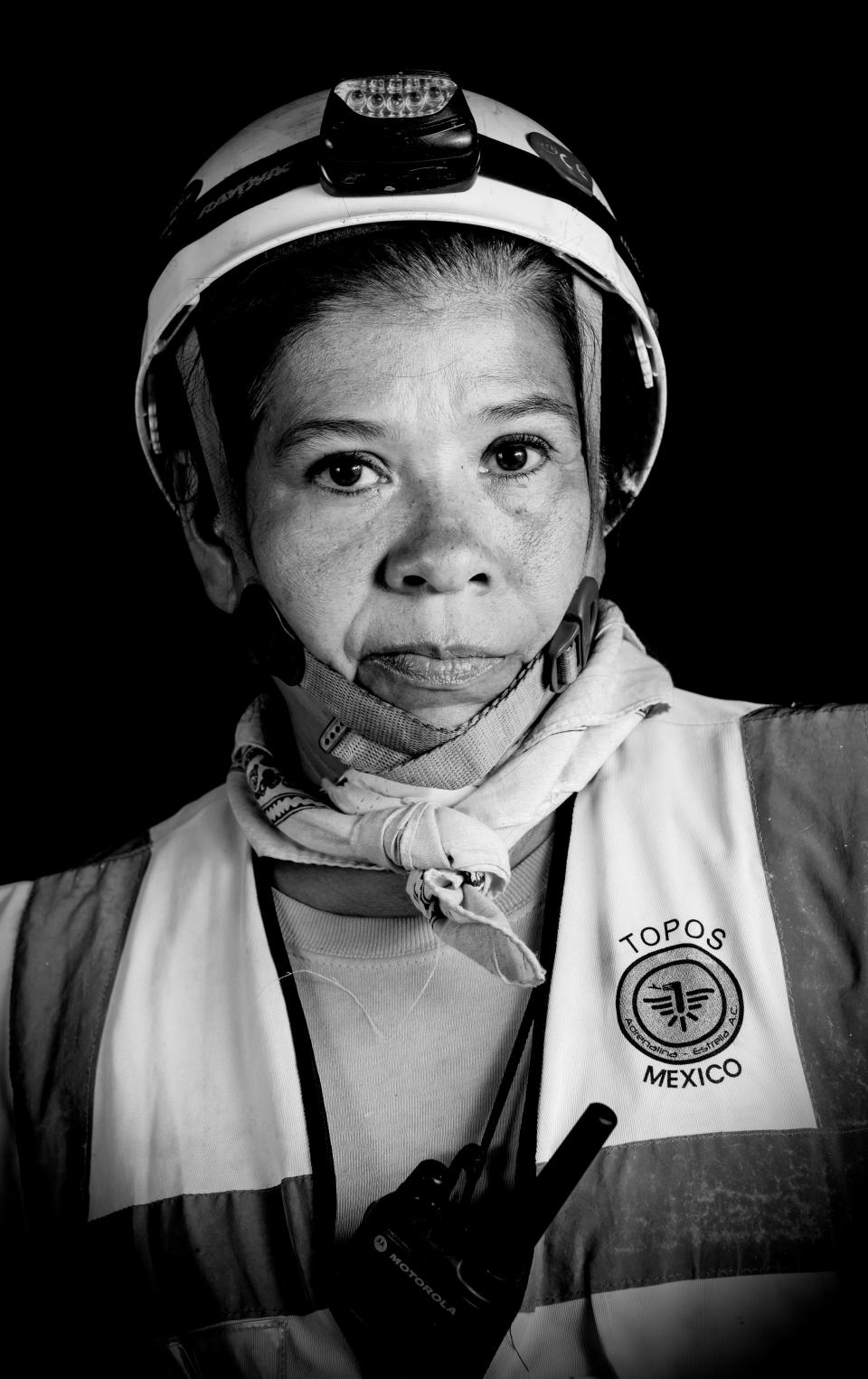 <p>Pola Diaz, a 53-year-old social worker and rescuer who volunteered as a “topo” (mole) — as the diggers who burrow their way into collapsed buildings are known — after the 7.1 earthquake that hit Mexico. (Photo: Omar Torres/AFP/Getty Images) </p>