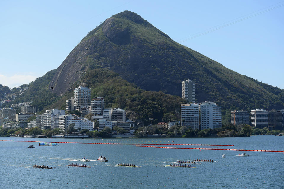 <p>Rowers compete during the Women’s Eight Final A on Day 8 of the Rio 2016 Olympic Games at the Lagoa Stadium on August 13, 2016 in Rio de Janeiro, Brazil. (Photo by Matthias Hangst/Getty Images) </p>