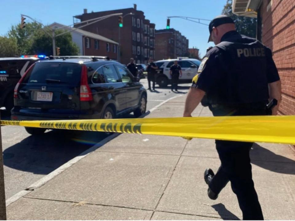 A Holyoke police officer responds to a shooting with multiple victims in a downtown neighborhood of Holyoke, Massachusetts (Holyoke Police Department)