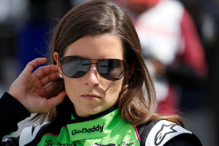 FILE PHOTO: Verizon IndyCar Series driver Danica Patrick gets ready to get in her car during practice for the 102nd Running of the Indianapolis 500 at Indianapolis Motor Speedway in Indianapolis, Indiana, U.S., May 15, 2018. Mandatory Credit: Brian Spurlock-USA TODAY Sports/File Photo