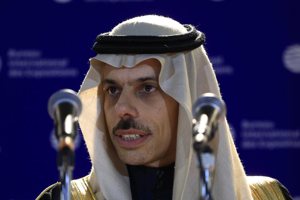 Saudi Foreign Minister Prince Faisal bin Farhan smiles speaks after the Bureau International des Expositions, or BIE, announced the vote Tuesday, Nov. 28, 2023 in Issy-les-Moulineaux, outside Paris. Saudi Arabia's capital Riyadh was chosen to host the 2030 World Expo, beating out South Korean port city Busan and Rome for an event expected to draw millions of visitors. Saudi Arabia's capital Riyadh was chosen on Tuesday to host the 2030 World Expo, beating out South Korean port city Busan and Rome for an event expected to draw millions of visitors. Riyadh was picked by a majority of 119 out of 165 votes by the member states. (AP Photo/Aurelien Morissard)