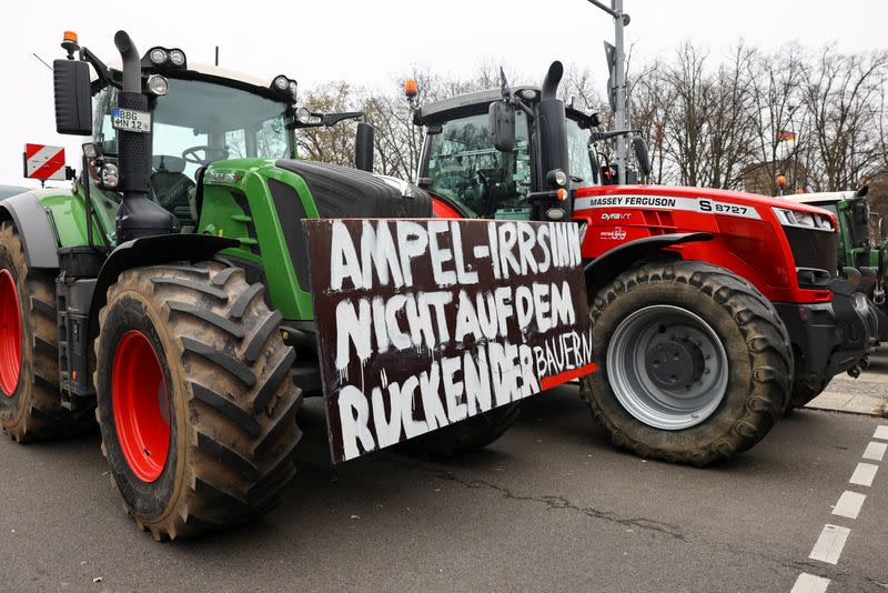 German farmers protest with tractors against the planned cut of vehicle tax subsidies in Berlin