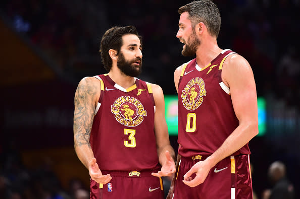 CLEVELAND, OHIO – DECEMBER 13: Ricky Rubio #3 talks with Kevin Love #0 of the Cleveland Cavaliers during the third quarter against the Miami Heat at Rocket Mortgage Fieldhouse on December 13, 2021 in Cleveland, Ohio.