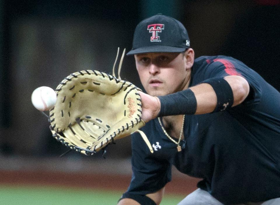 Texas Tech first baseman Cole Stilwell takes infield practice during the Red Raiders' workout Tuesday at Globe Life Field in Arlington. Ninth-ranked Tech opens the Big 12 tournament at 4 p.m. Wednesday against Kansas State.