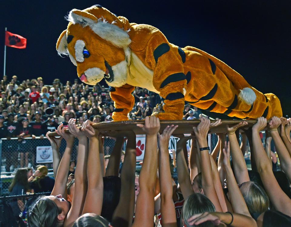 Palmetto's mascot tiger doing 28 push-ups, the score of the Palmetto's points during the first half of play. Palmetto with a 49-31 victory over the Sarasota Sailors Thursday night, Sept. 14, 2023, at Harllee Stadium in Palmetto.