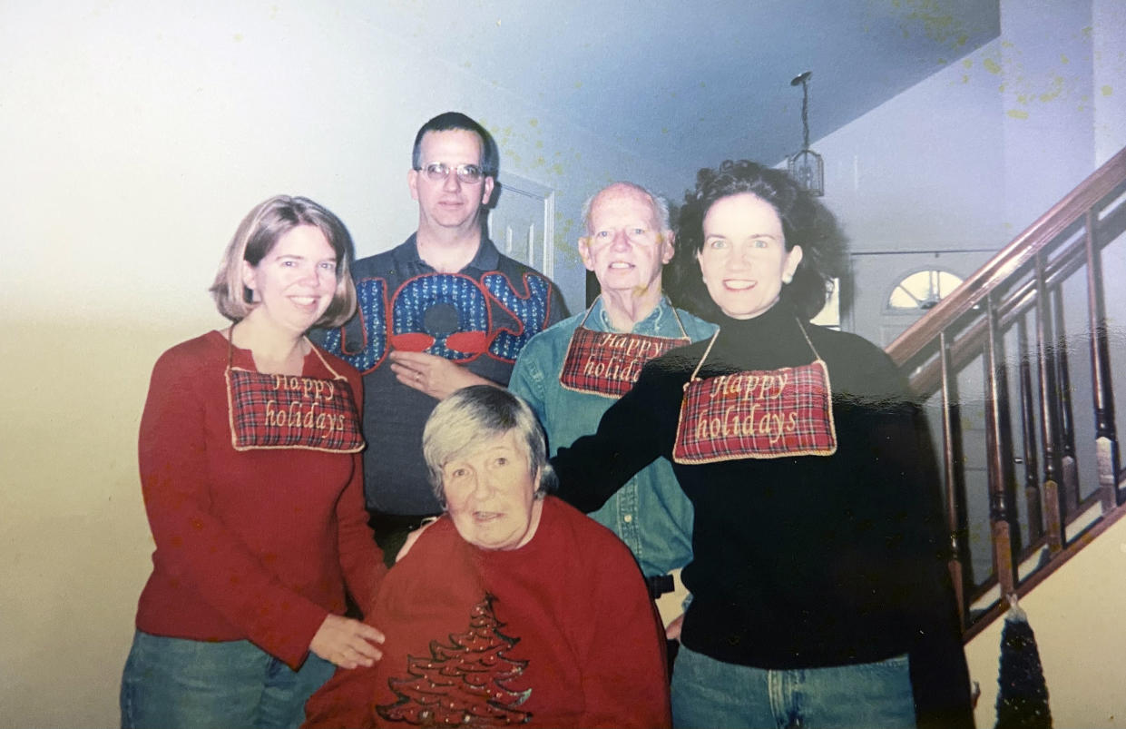 My mom (bottom, in red) and me (left, also in red) with our family. (Courtesy Sharon Waters)