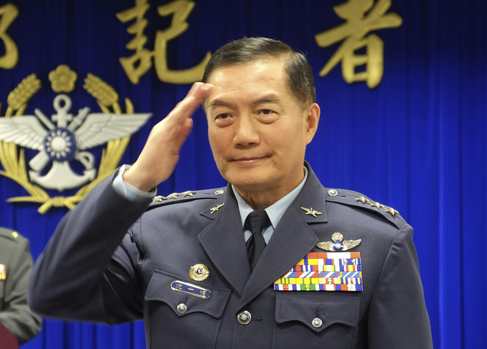 FILE - In this March 7, 2019, file photo, Taiwanese top military official Shen Yi-ming salutes as he is introduced to journalists during a press conference in Taipei, Taiwan. The defense ministry confirmed that Shen and a number of others were killed in a helicopter crash in a mountainous area in New Taipei City early Thursday morning. (AP Photo/Johnson Lai, File)