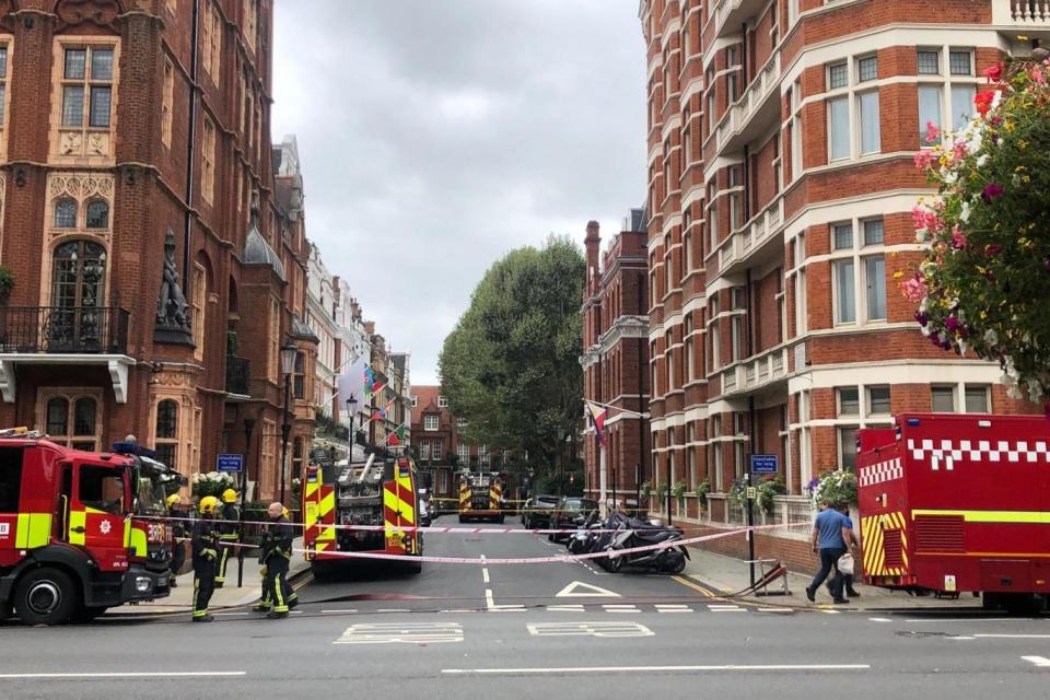 Firefighters respond to the incident as Kensington High Street is closed off (Simon Freeman)