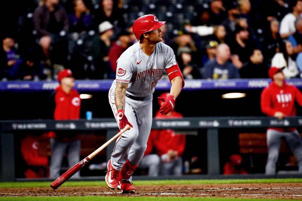 Cincinnati Reds' Nick Senzel hits a two-run home run in the seventh inning game against the Colorado Rockies
