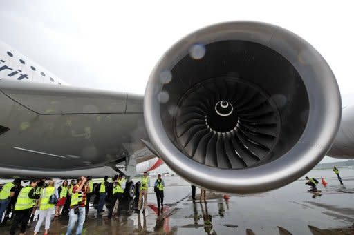 A Qantas Airbus A380 jet, dubbed "Nancy Bird Walton" in honour of Australia's first female commercial pilot, sits on the tarmac following repairs at the Changi International Airport in Singapore, on April 21