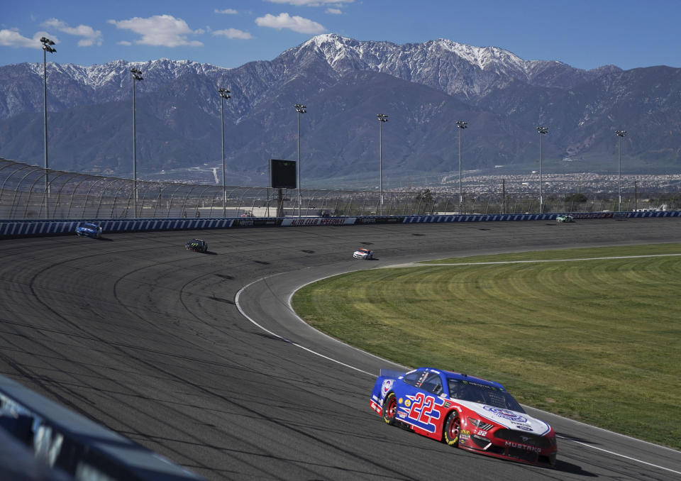 Joey Logano leads during the NASCAR Cup Series auto race at Auto Club Speedway in Fontana, Calif., Sunday, March 17, 2019. Kyle Busch won the race. (AP Photo/Rachel Luna)