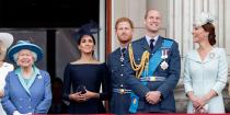 <p>Queen Elizabeth, the Duke and Duchess of Sussex, and the Duke and Duchess of Sussex watch a flypast to mark the centenary of the Royal Air Force from the balcony of Buckingham Palace. </p>