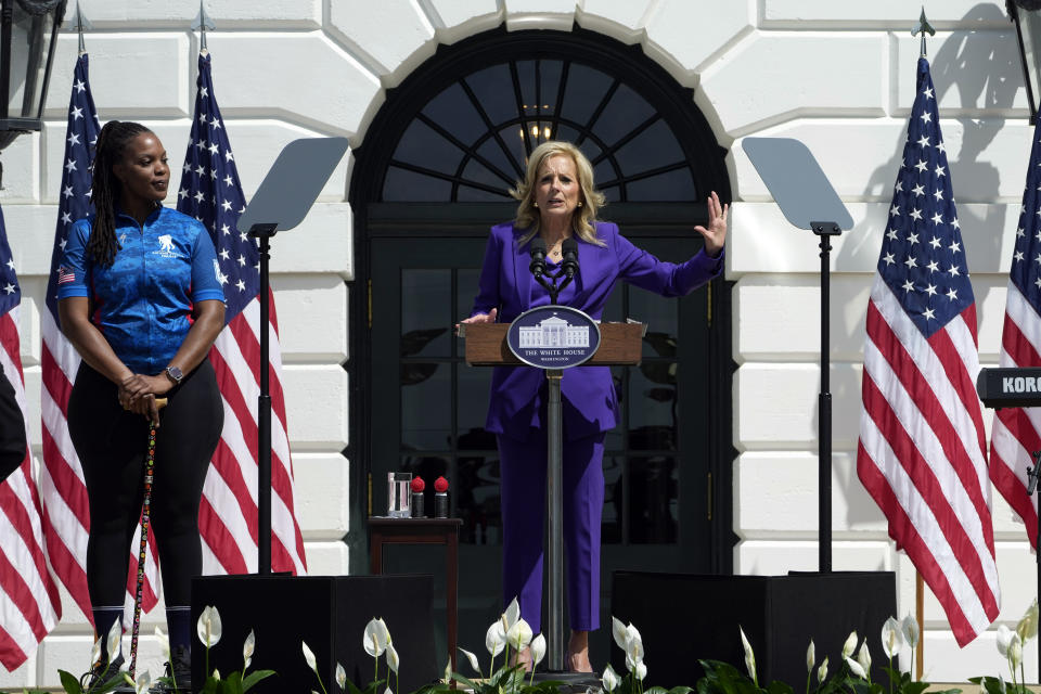 First lady Jill Biden, right, standing with Sharona Young, retired naval chief petty officer, left, speaks before the start of the Wounded Warrior Project's Soldier Ride on the South Lawn of the White House in Washington, Wednesday, April 24, 2024. (AP Photo/Susan Walsh)