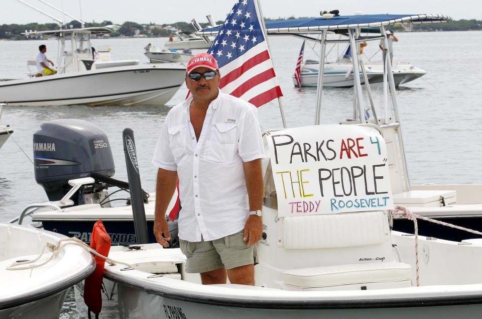 A sport fishing guide takes part with colleagues from the Upper Florida Keys in a protest over closure of Everglades National Park waters for fishing as part of the U.S. government shutdown, on Cowpens Channel, on the Eastern boundary of the Park near Islamorada, Florida October 9, 2013. The U.S. Department of the Interior said October 10, 2013 it will consider re-opening national parks in some states that make special requests to Secretary Sally Jewell and can fully fund their own personnel. (REUTERS/Joe Skipper/Files)