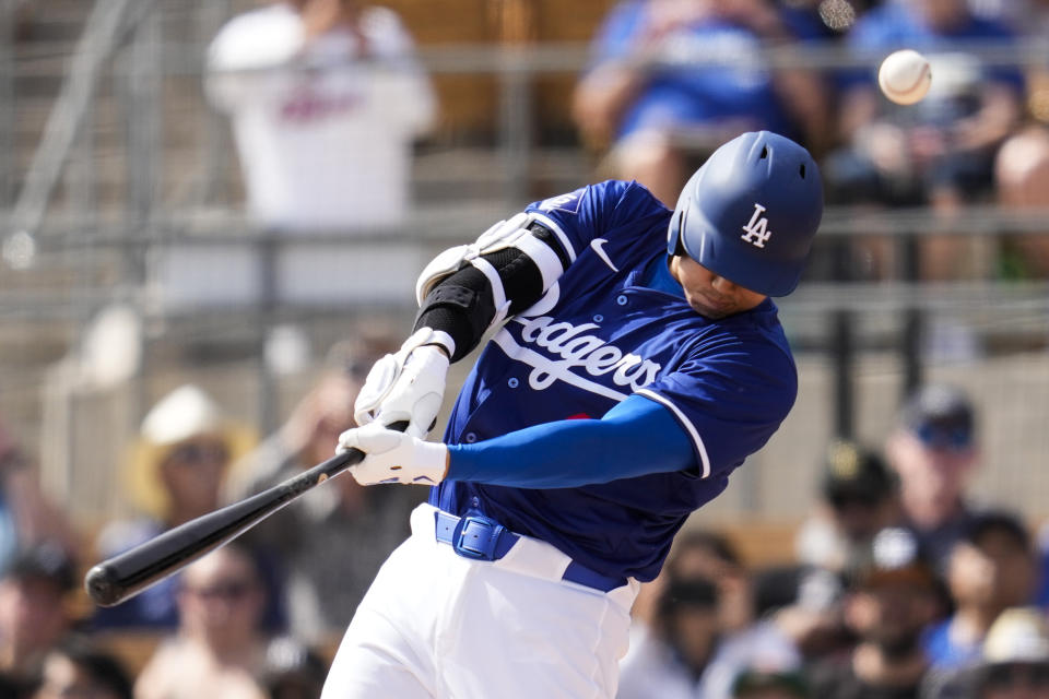 Los Angeles Dodgers designated hitter Shohei Ohtani hits a foul ball during the first inning of a spring training baseball game against the Chicago White Sox in Phoenix, Tuesday, Feb. 27, 2024. (AP Photo/Ashley Landis)