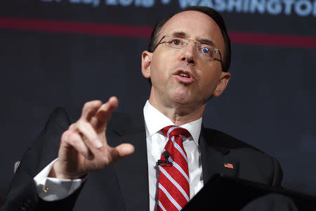 FILE PHOTO: U.S. Deputy Attorney General Rod Rosenstein speaks at the Compliance Week 13th Annual Conference in Washington, U.S., May 21, 2018. REUTERS/Joshua Roberts/File Photo
