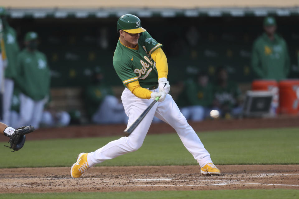 Oakland Athletics' Matt Chapman hits a solo home run against the Toronto Blue Jays during the fourth inning of a baseball game in Oakland, Calif., Wednesday, May 5, 2021. (AP Photo/Jed Jacobsohn)