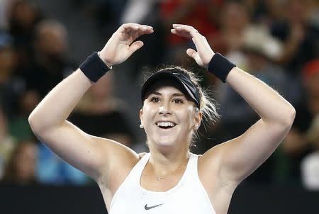 Tennis - Australian Open - Venus Williams of the U.S. v Belinda Bencic of Switzerland - Rod Laver Arena, Melbourne, Australia, January 15, 2018. Bencic celebrates after winning her match. REUTERS/Thomas Peter