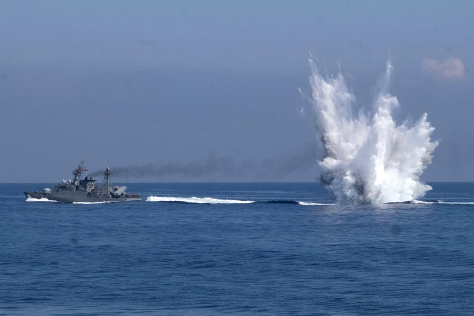 FILE - A Ching Chiang class patrol ship fires off depth charges underwater as part of a navy demonstration in Taiwan's annual Han Kuang exercises off the island's eastern coast near the city of Yilan, Taiwan on Tuesday, July 26, 2022. The crisis sparked by House Speaker Nancy Pelosi’s potential visit to Taiwan misses a key point, experts say: that the real focus should be on how the United States and China manage their differences so the risks of confrontation don’t spiral out of control. (AP Photo/Huizhong Wu, File)