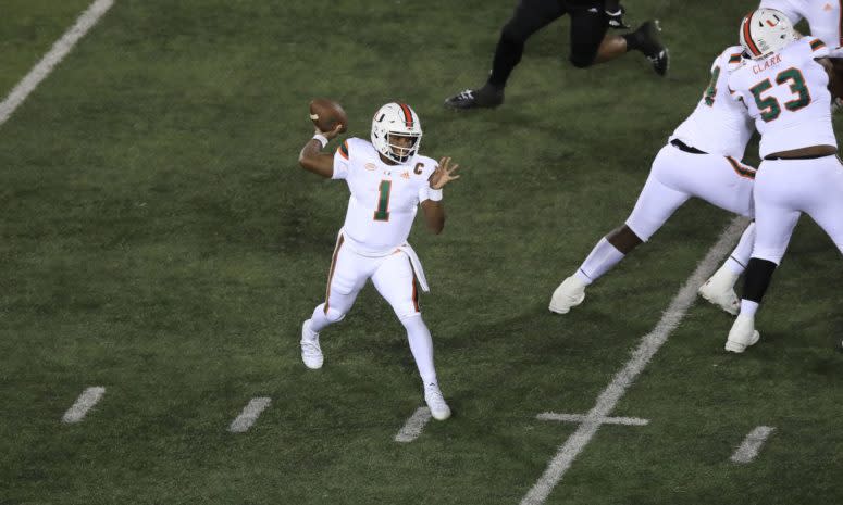 Miami football's D'Eriq King throws a pass.