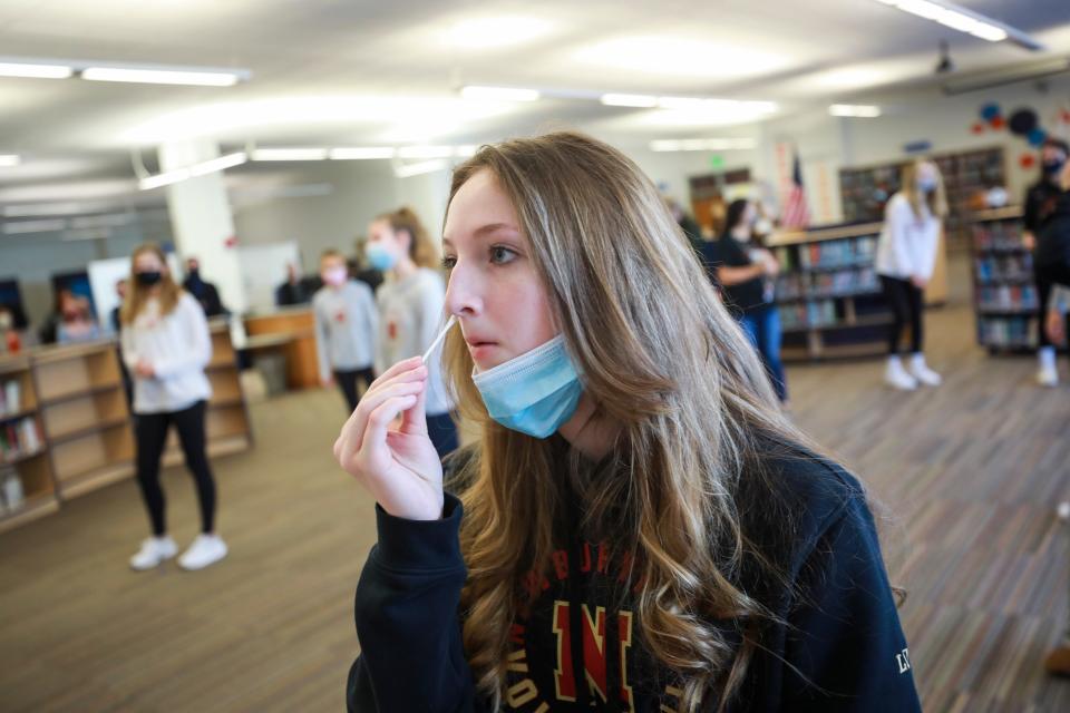 Student Emma Low takes part in a pooled COVID-19 testing program at the Nock-Molin Middle School in Newburyport on Feb. 25, 2021.